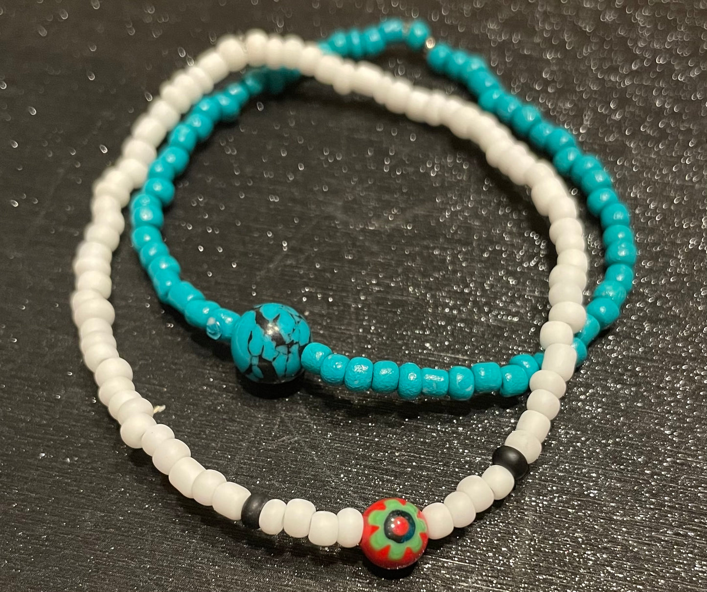 Turquoise and white bracelets