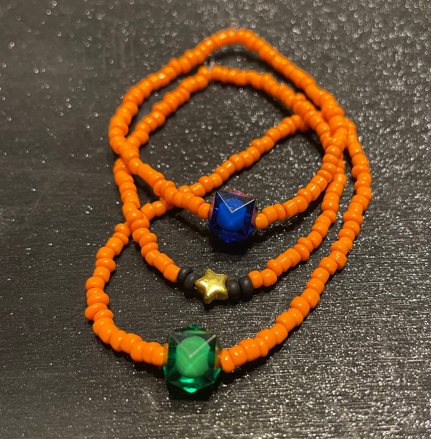 3 orange bracelets