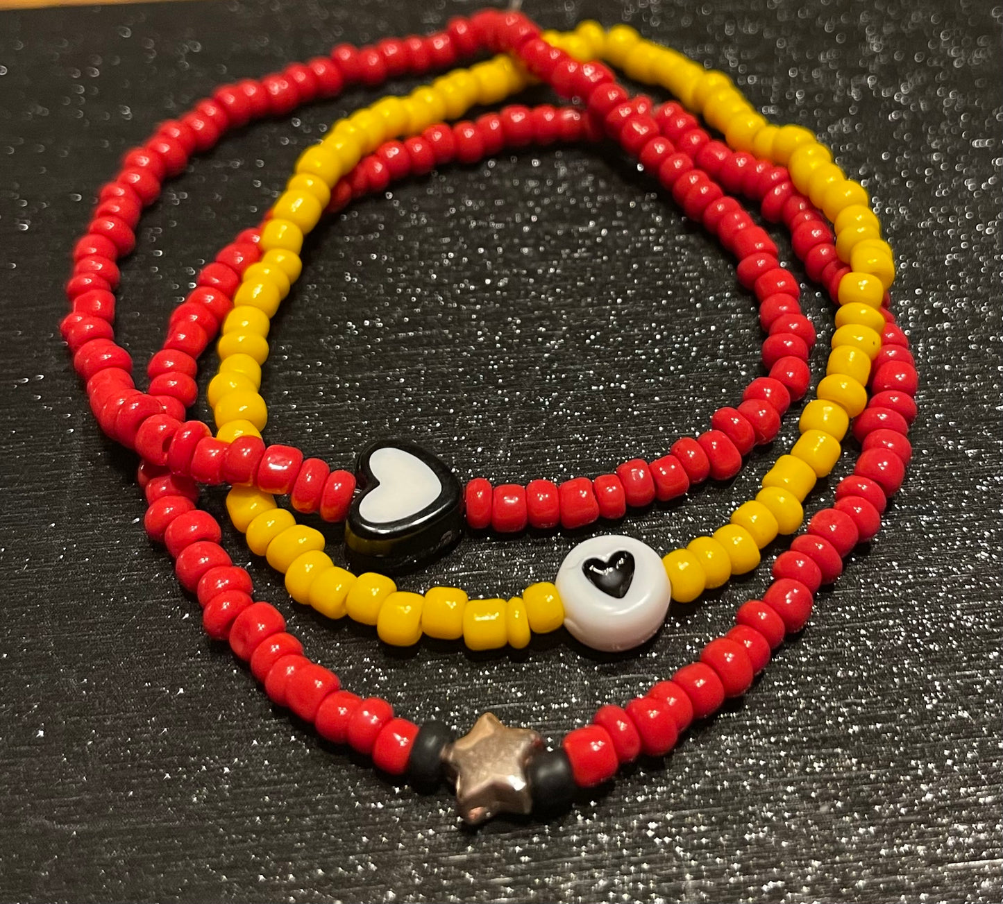 Yellow and red bracelets