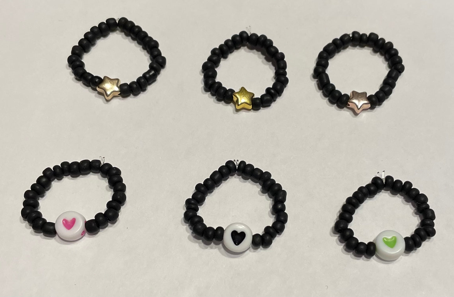 Black hearts and stars rings